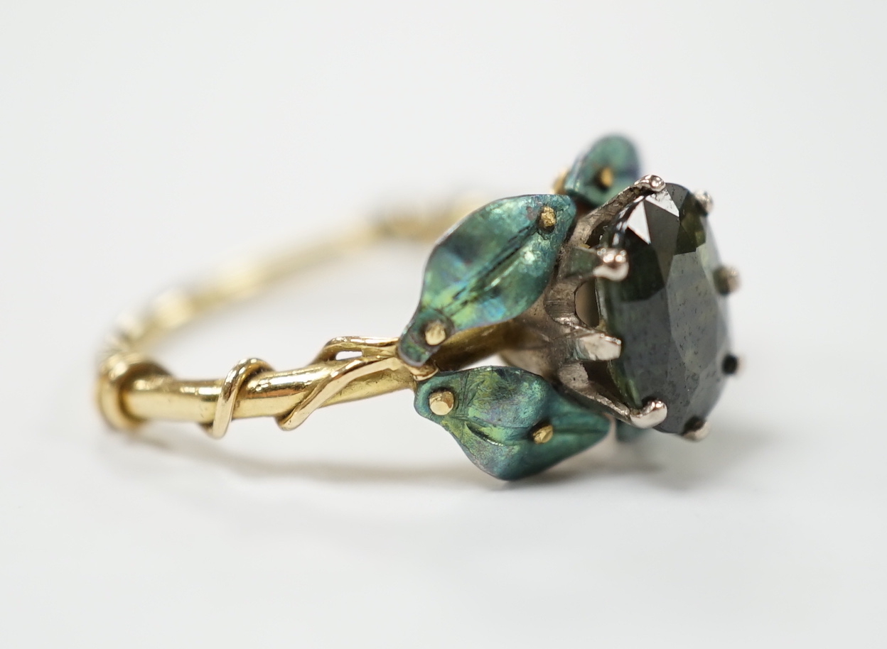 A late Victorian gilt white metal and green paste set bug brooch, 23mm.